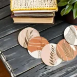 boho-floral-leaf-wooden-coaster-set-lifestyle-dark-table