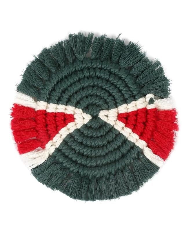 Emerald tribal macrame coaster styled with a mug