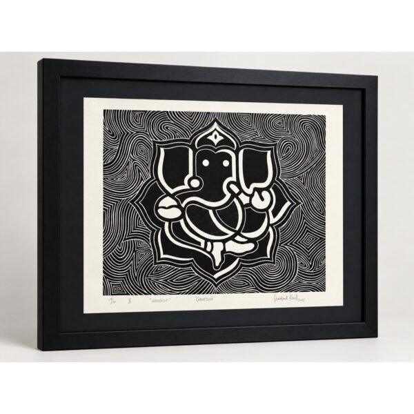 Angled view of Sacred Ganesha woodcut wall art with black frame