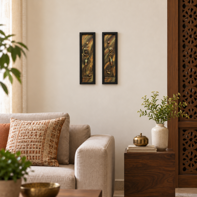 Handcrafted tribal women 3D clay wall art set of 2 displayed in a living room