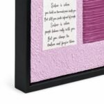 Side angle close-up of Sabar textured canvas wall art in black floating frame